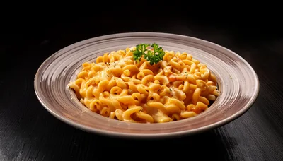 Bowl Of Creamy Macaroni And Cheese With Parsley