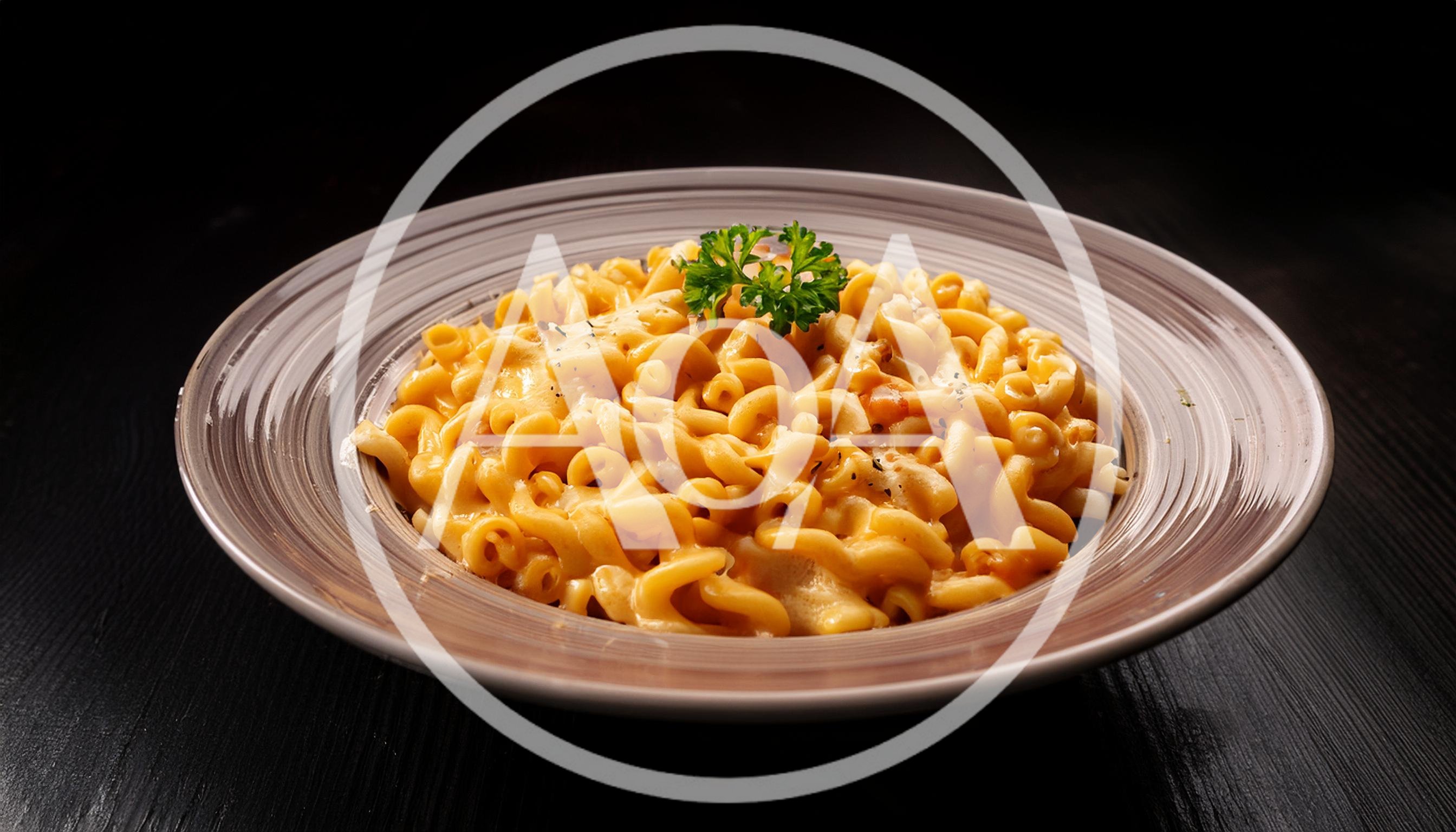 Bowl Of Creamy Macaroni And Cheese With Parsley