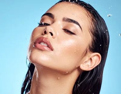 Beautiful Woman With Wet Skin And Hair