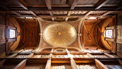 Ornate Wooden Ceiling With Central Dome In Historic Building