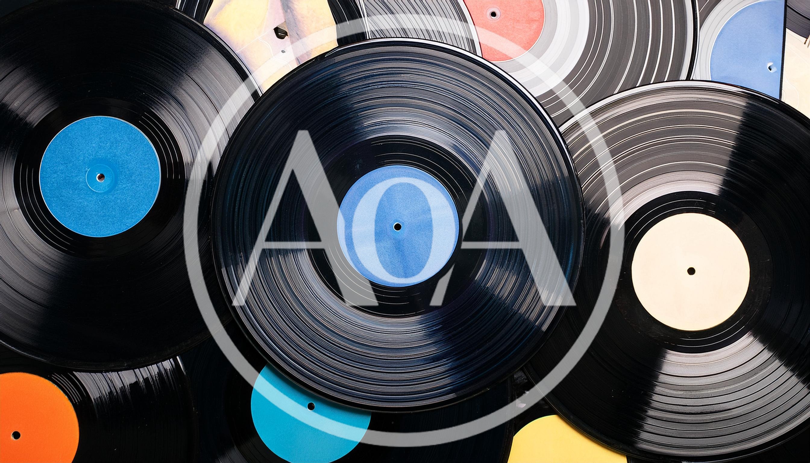 Collection Of Vintage Vinyl Records Stacked Together