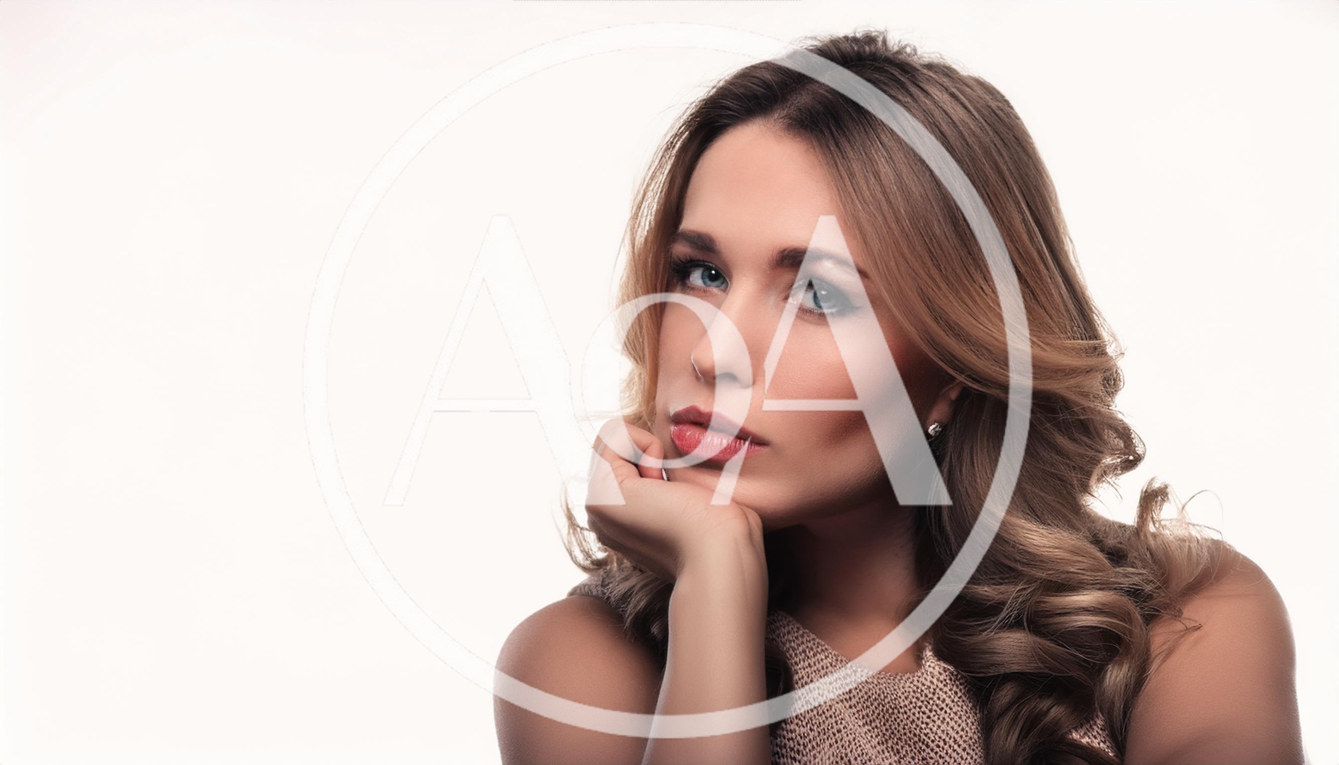Portrait Of A Beautiful Woman Resting Chin On Hand
