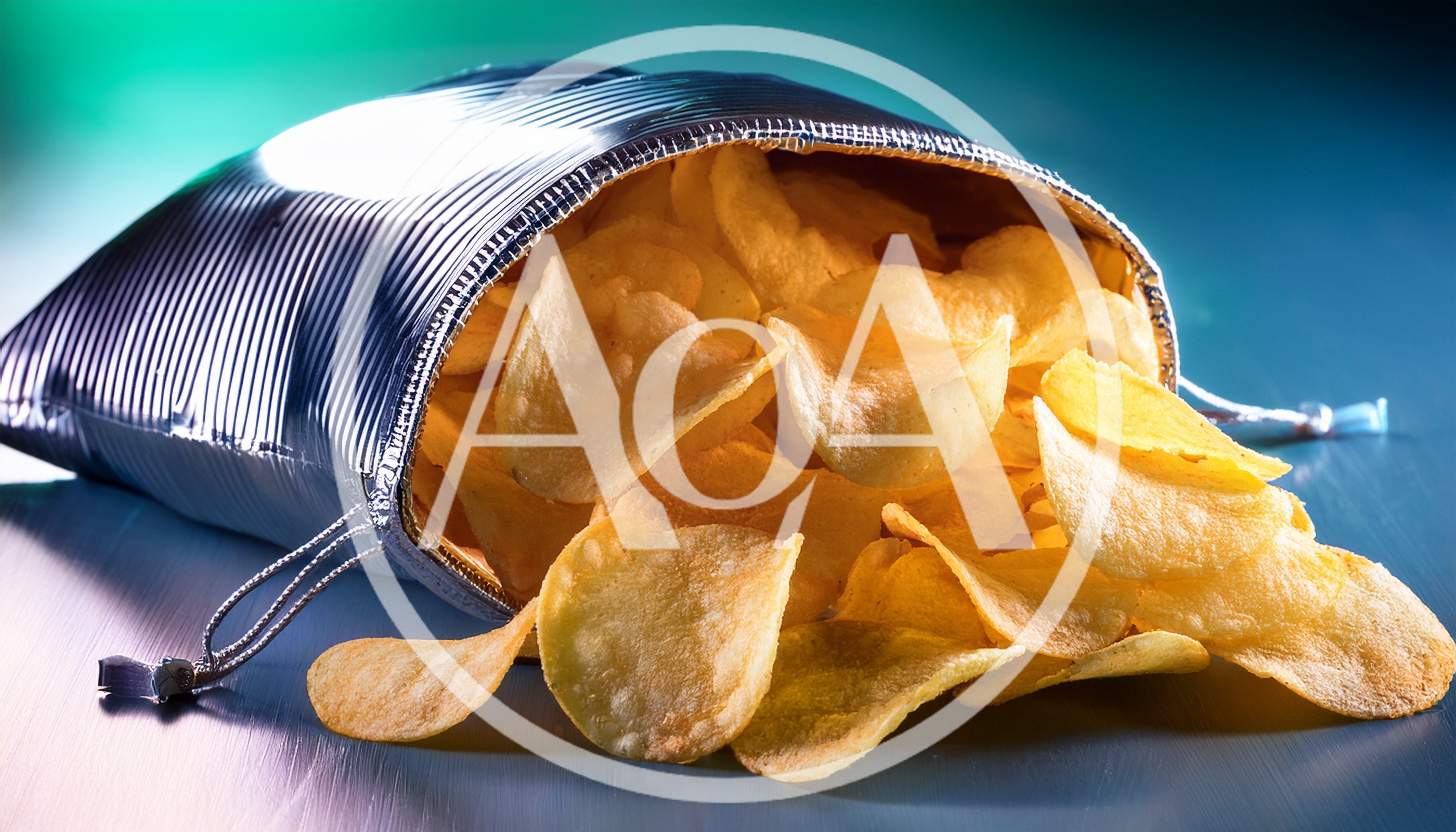 Potato Chips Spilling From A Metallic Foil Bag