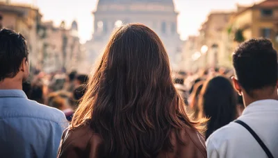 People Walking Through A Busy City Street