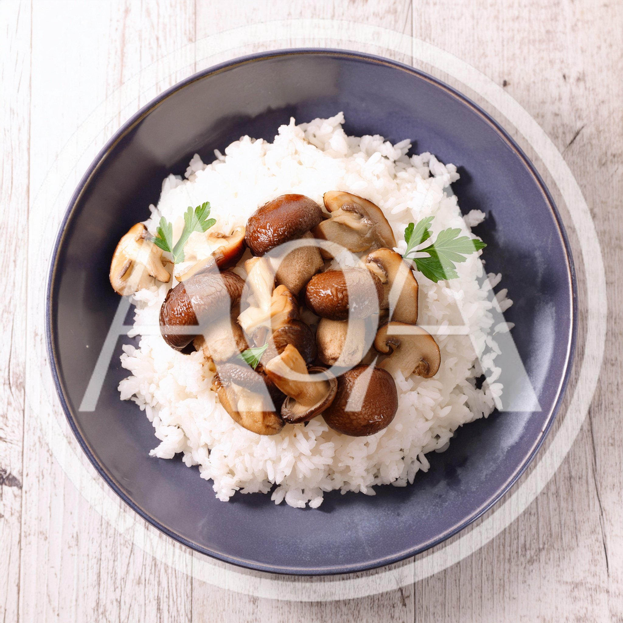 Bowl Of Steamed White Rice With Sautéed Mushrooms