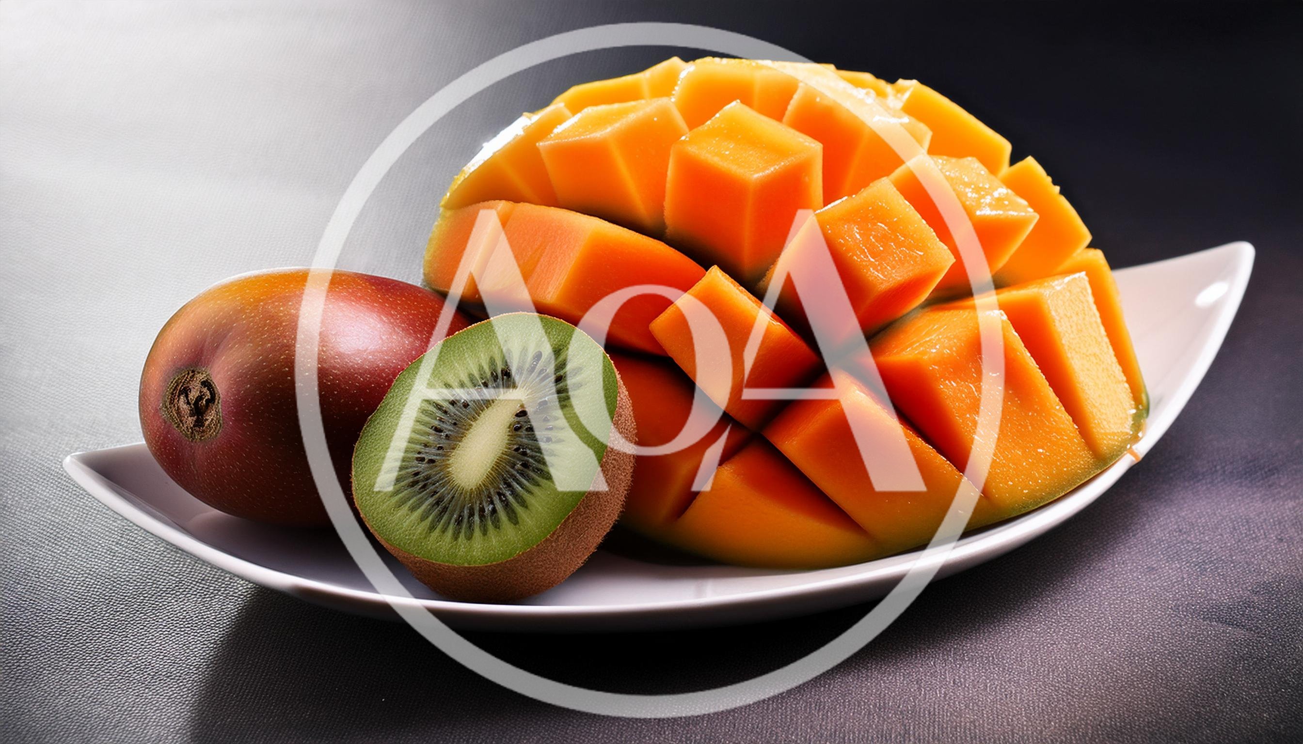 Fresh Mango And Kiwi Fruit On A White Plate