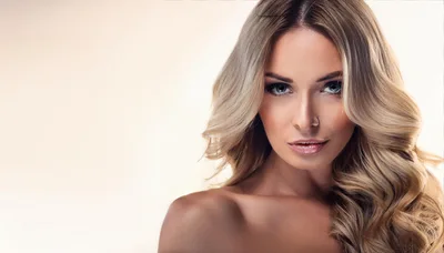 Portrait Of A Beautiful Blonde Woman With Wavy Hair