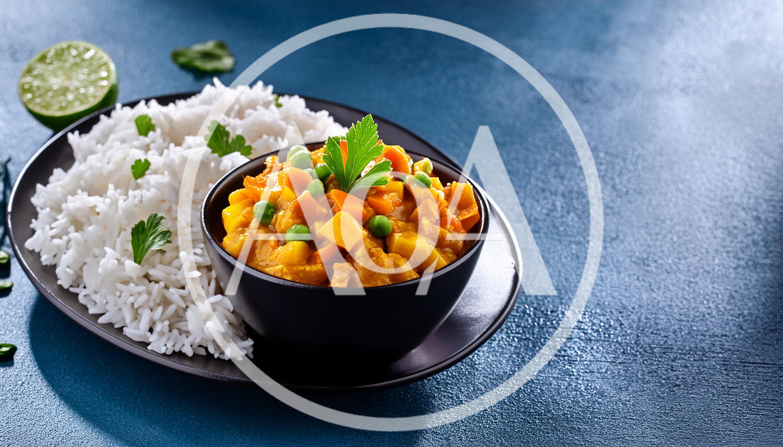 Bowl Of Vegetable Curry With Steamed White Rice