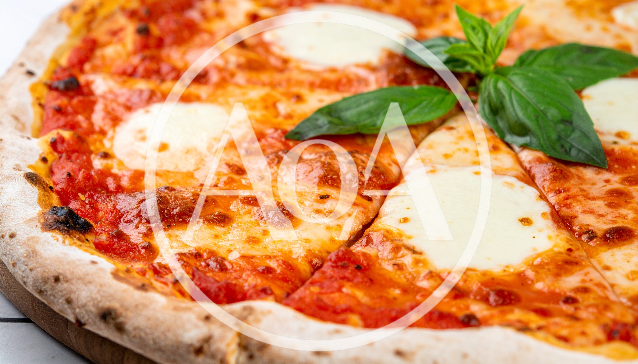 Fresh Margherita Pizza With Basil Leaves