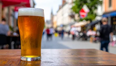 Glass Of Beer On A Table In A Busy Street