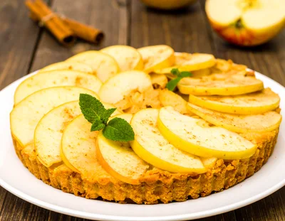Freshly Baked Apple Tart on a Wooden Table