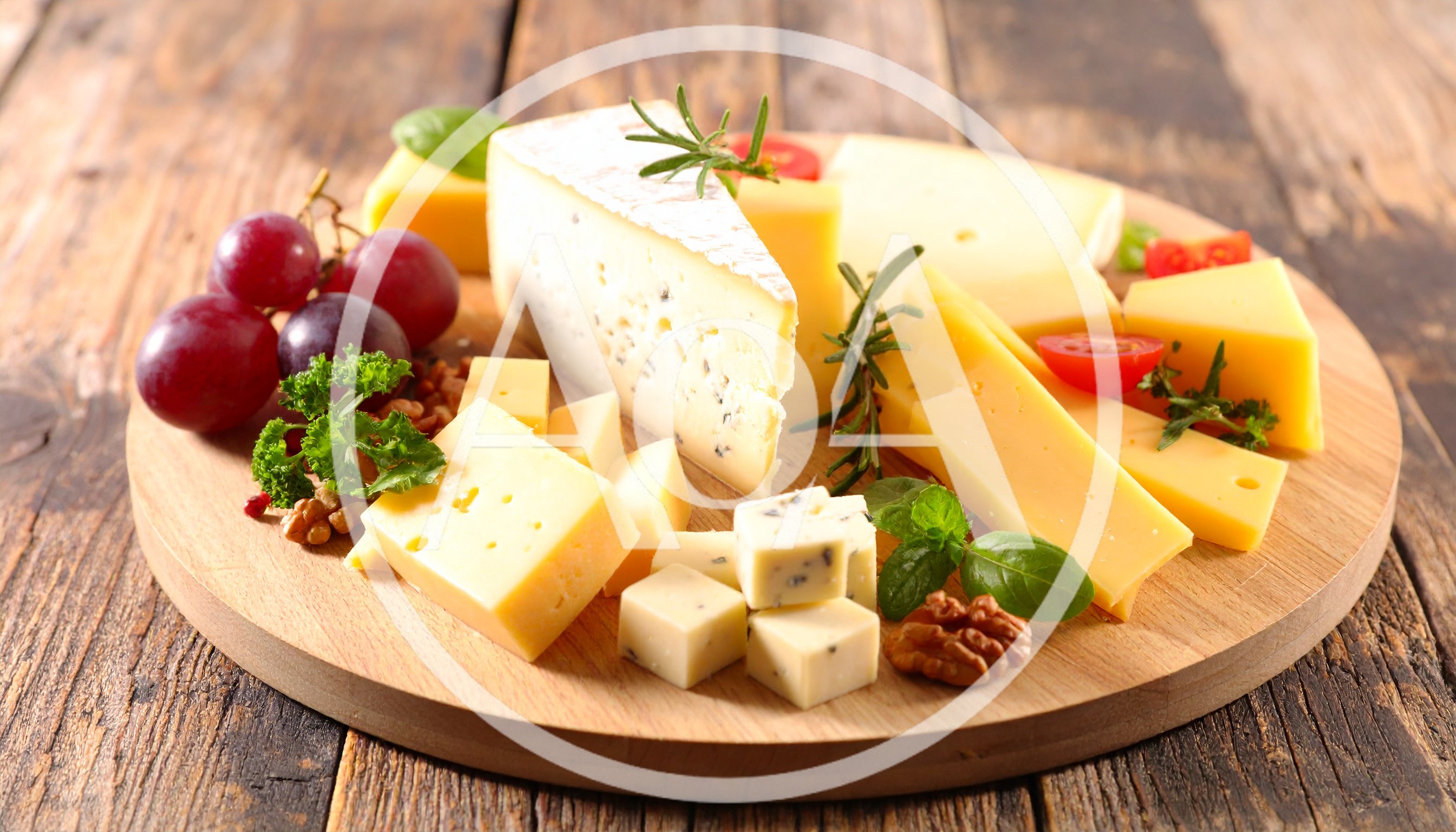 Assorted Cheese Platter With Grapes And Walnuts