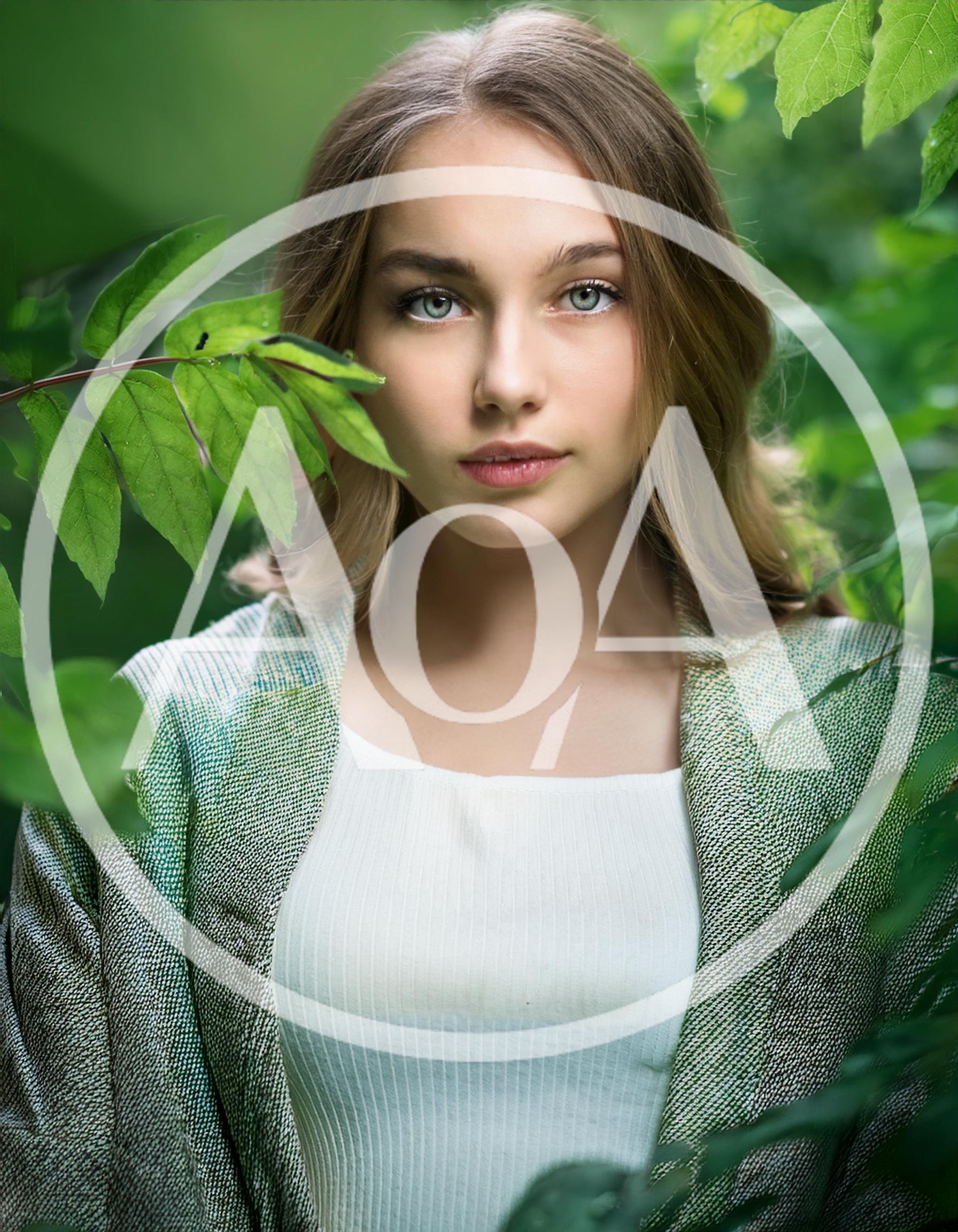 Portrait of a Young Woman Surrounded by Lush Greenery