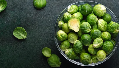 Fresh Brussels Sprouts in a Glass Bowl