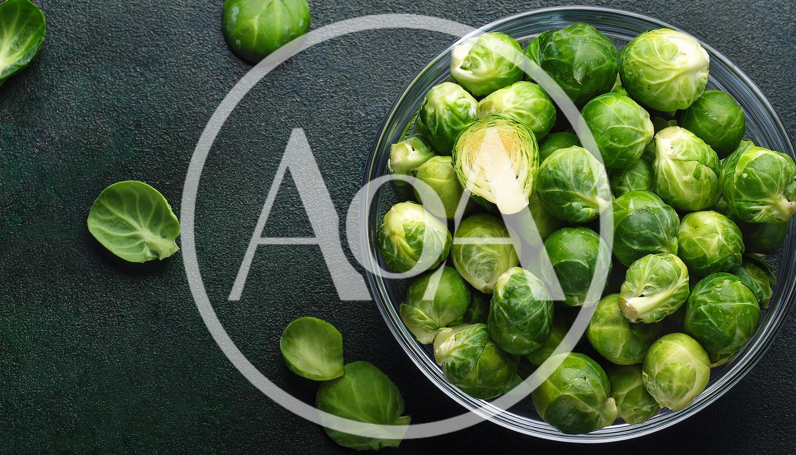 Fresh Brussels Sprouts in a Glass Bowl