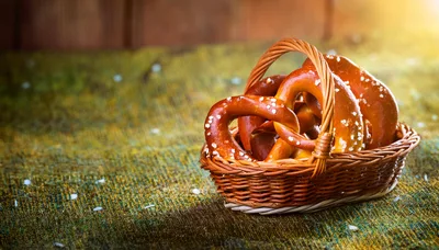 Freshly Baked Salted Pretzels In A Wicker Basket