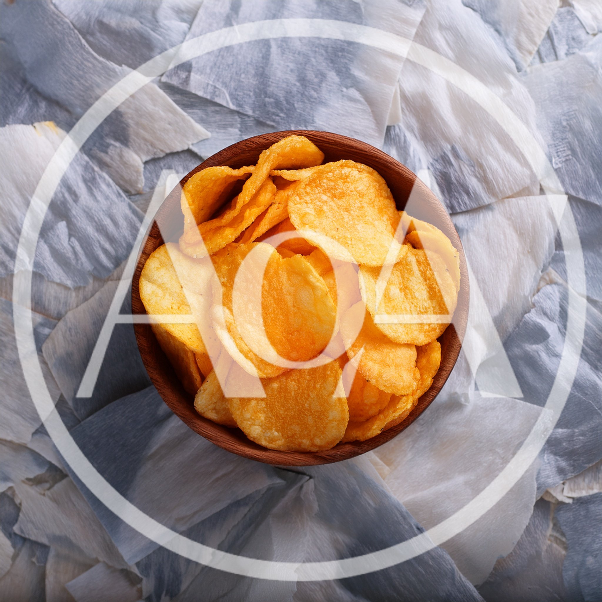 Wooden Bowl Filled With Crispy Potato Chips