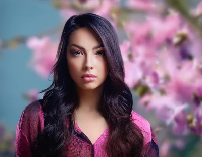 Portrait Of A Beautiful Young Woman With Long Dark Hair
