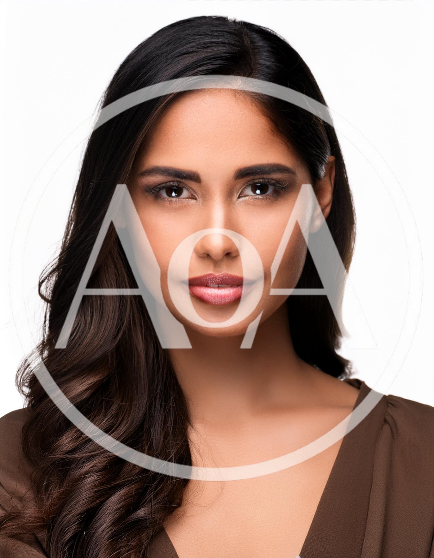Portrait Of A Beautiful Young Woman With Long Hair