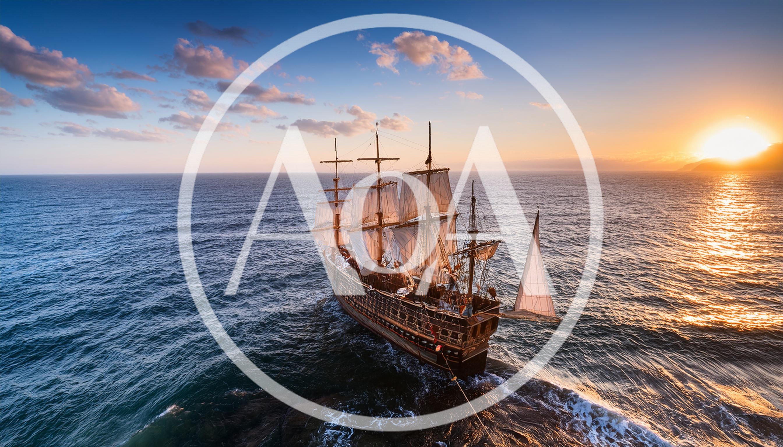 Historic Wooden Sailing Ship Anchored Near Rocky Coastline