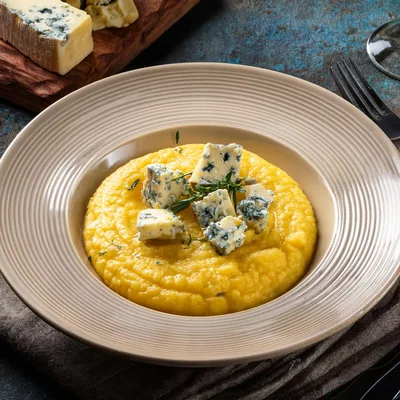 Creamy Polenta Topped With Gorgonzola Cheese