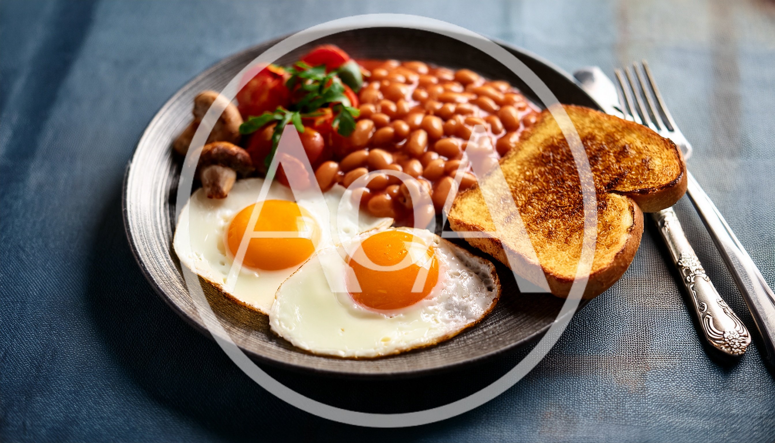 Full English Breakfast With Fried Eggs And Toast