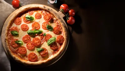 Fresh Margherita Pizza With Cherry Tomatoes And Basil