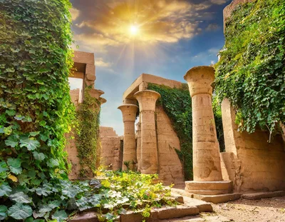 Ancient Egyptian Temple Ruins With Lush Green Ivy