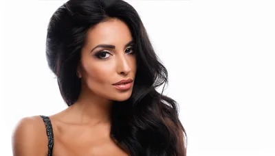 Portrait Of A Beautiful Woman With Long Wavy Hair