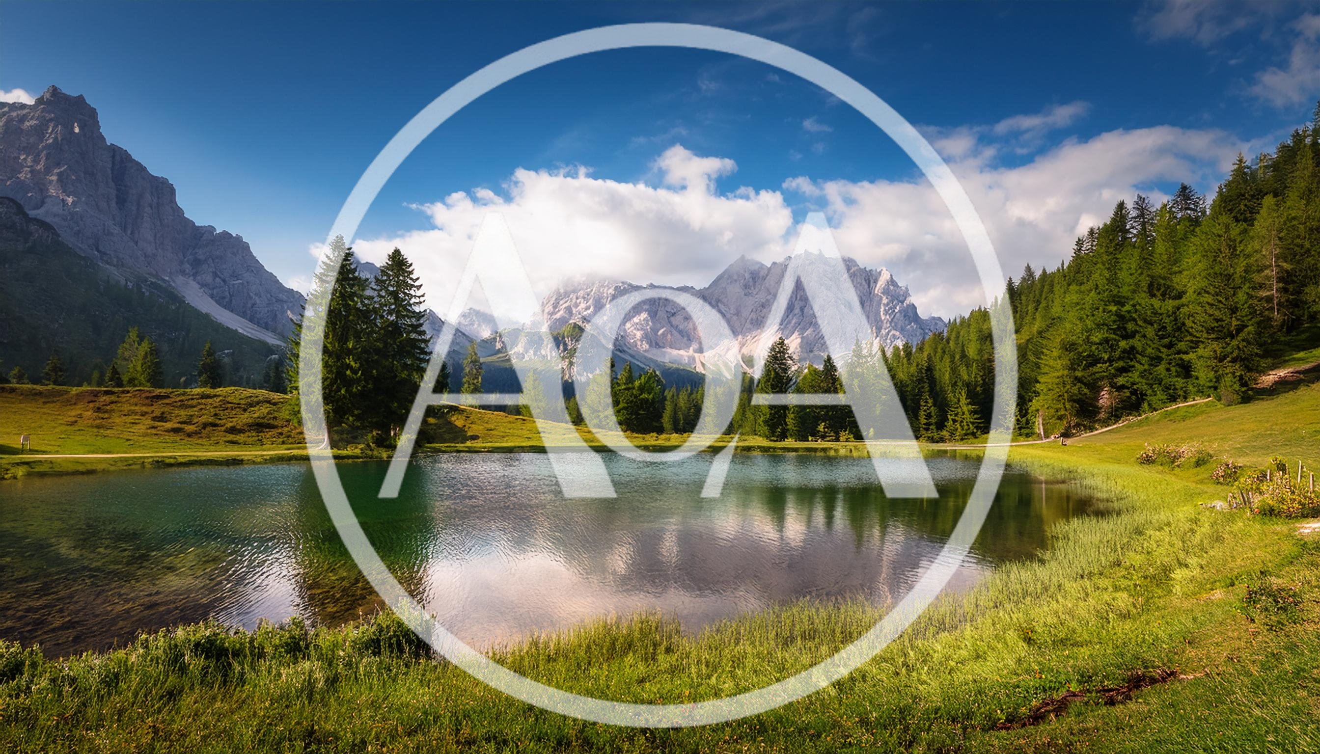 Scenic Alpine Lake With Mountain Peaks And Pine Forest