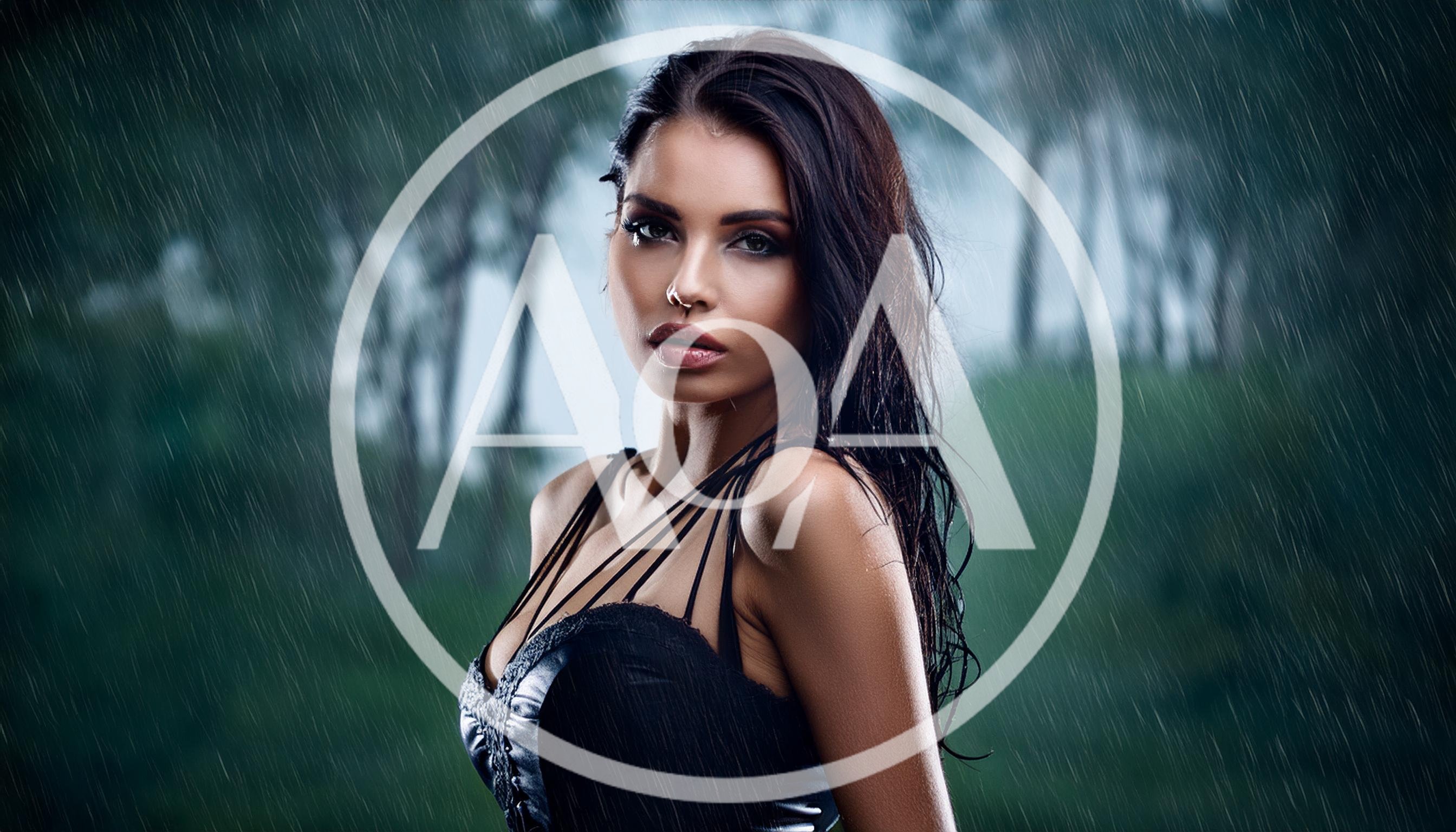Portrait Of A Beautiful Woman Standing In The Rain