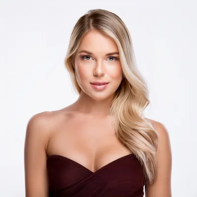 Portrait Of A Beautiful Blonde Woman In A Dress