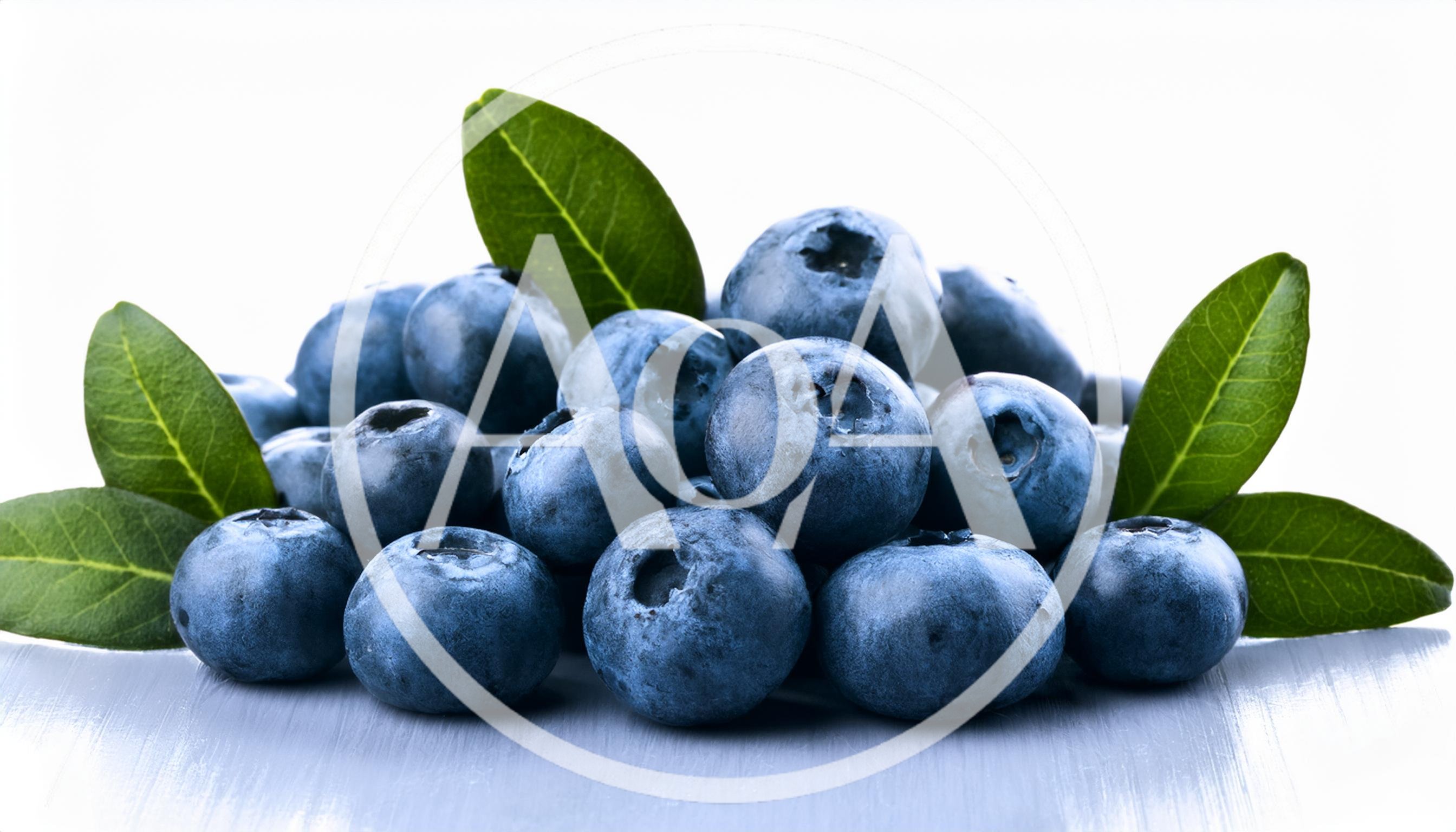 Fresh Blueberries With Green Leaves On A Wooden Surface