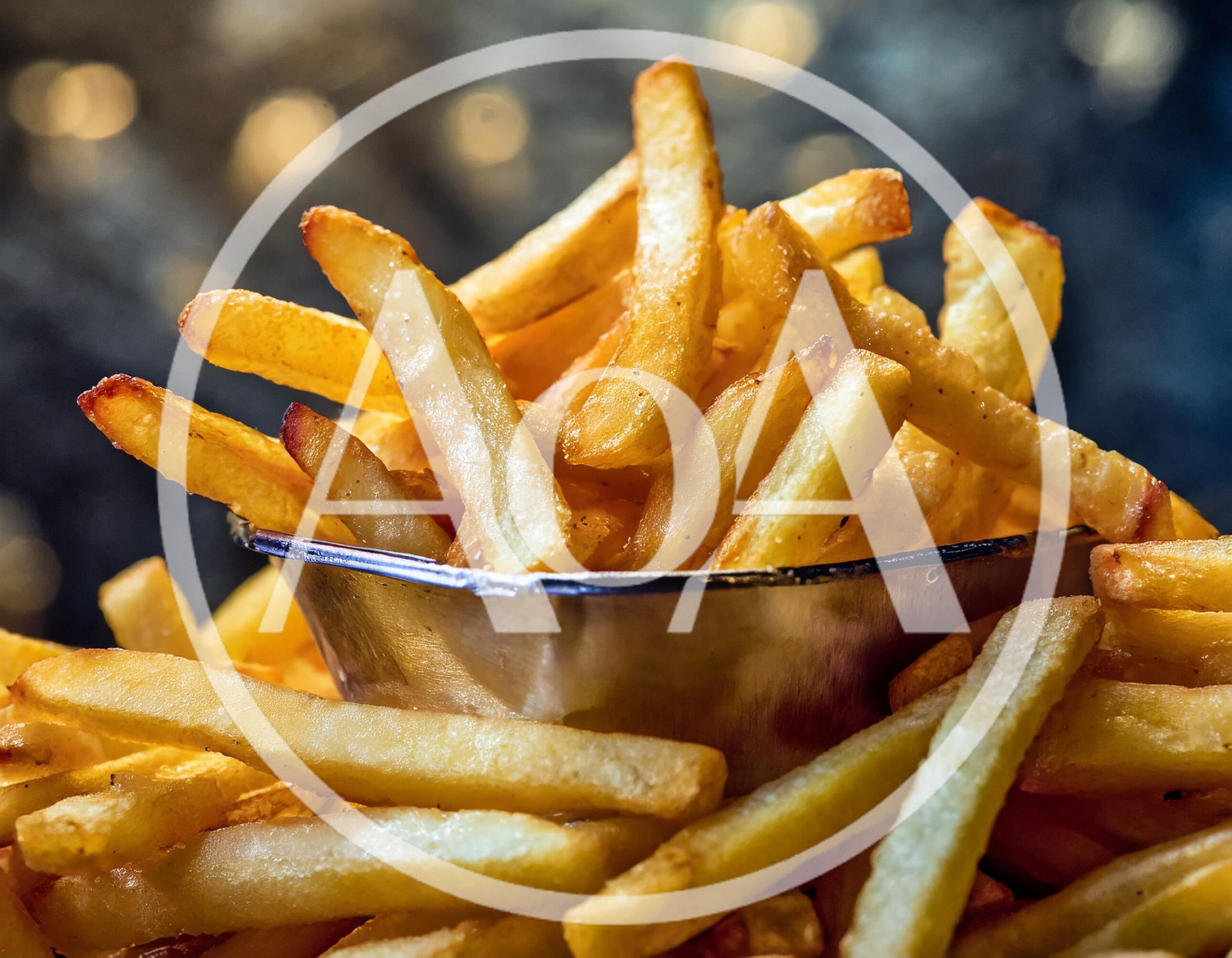 Golden Crispy French Fries In A Metal Cup