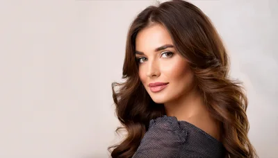 Portrait Of A Beautiful Woman With Wavy Brown Hair