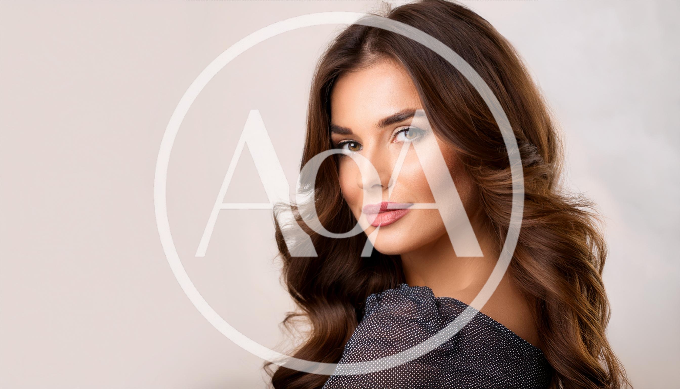Portrait Of A Beautiful Woman With Wavy Brown Hair