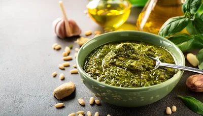 Fresh Green Pesto Sauce in a Ceramic Bowl