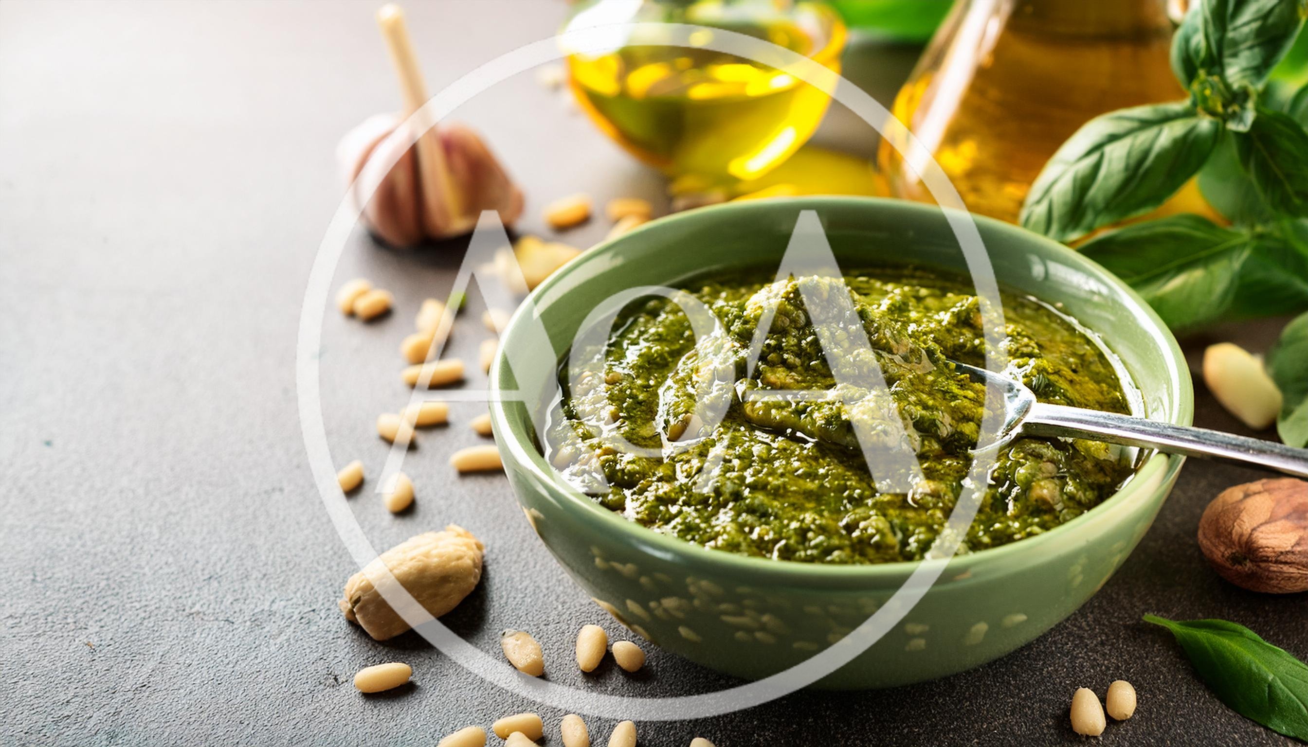 Fresh Green Pesto Sauce in a Ceramic Bowl