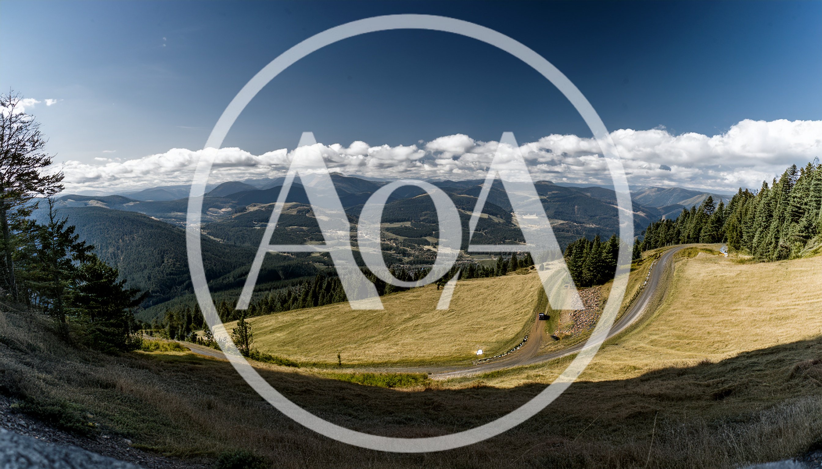Panoramic View Of Mountain Landscape With Winding Road