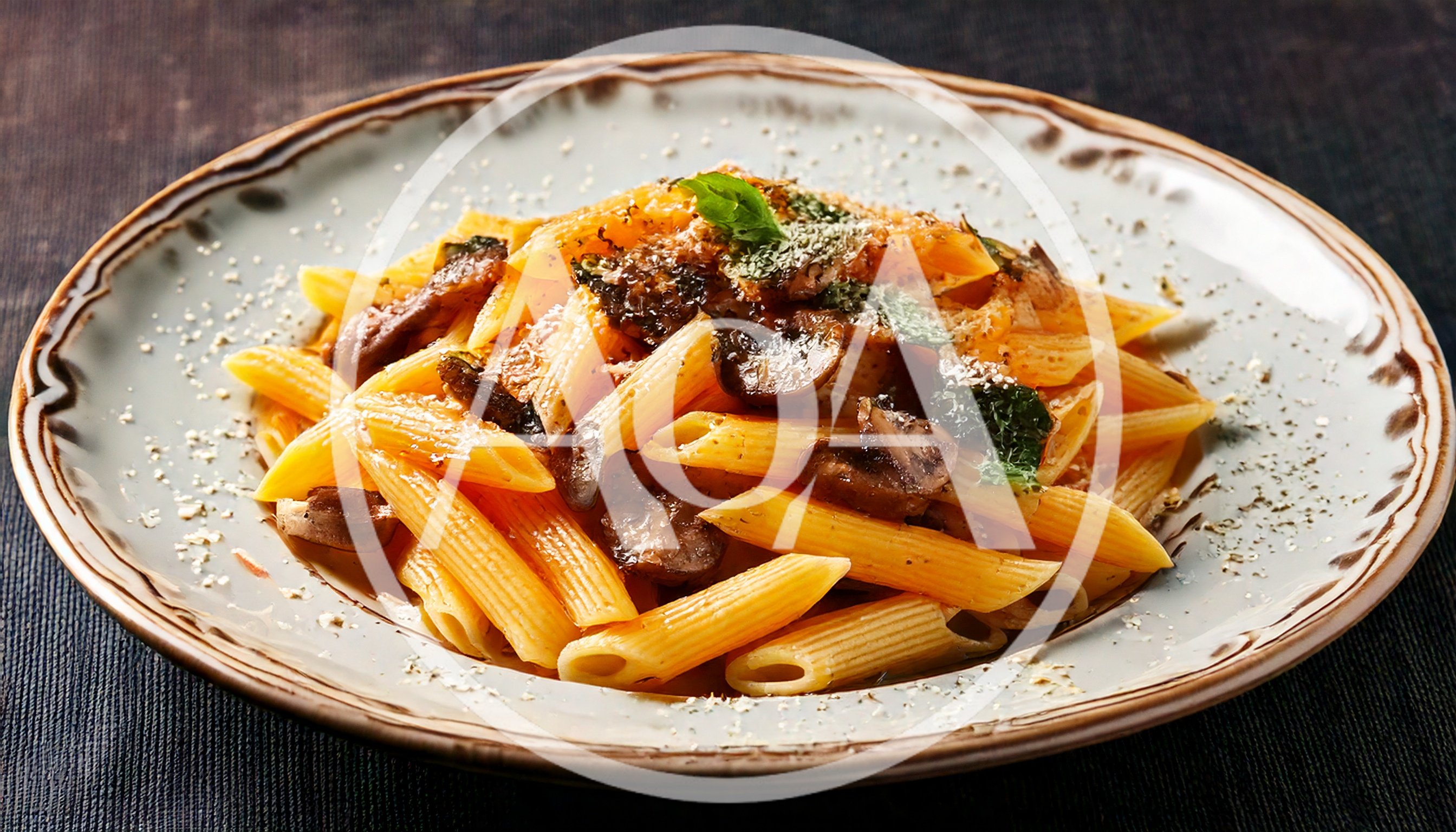 Penne Pasta With Mushrooms On A Decorative Plate