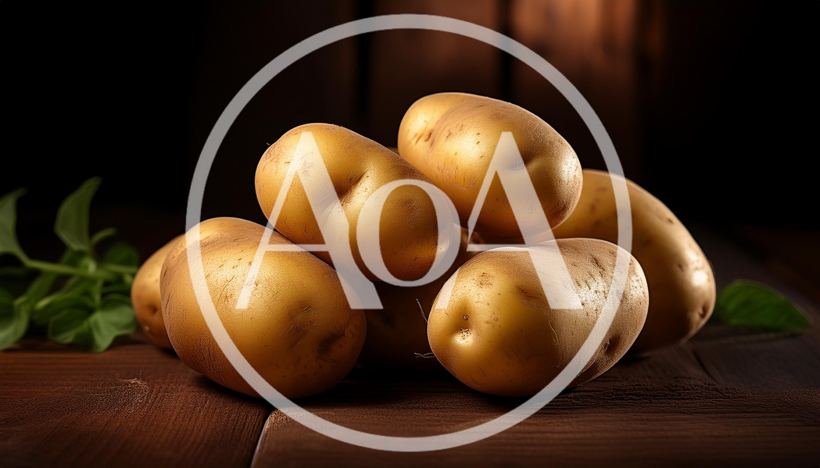 Fresh Raw Potatoes Stacked On A Rustic Wooden Table