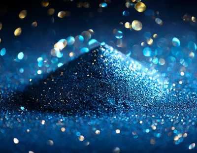Blue Glitter Pile With Bokeh Background