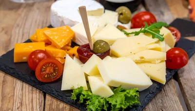Gourmet Cheese Platter With Fresh Vegetables