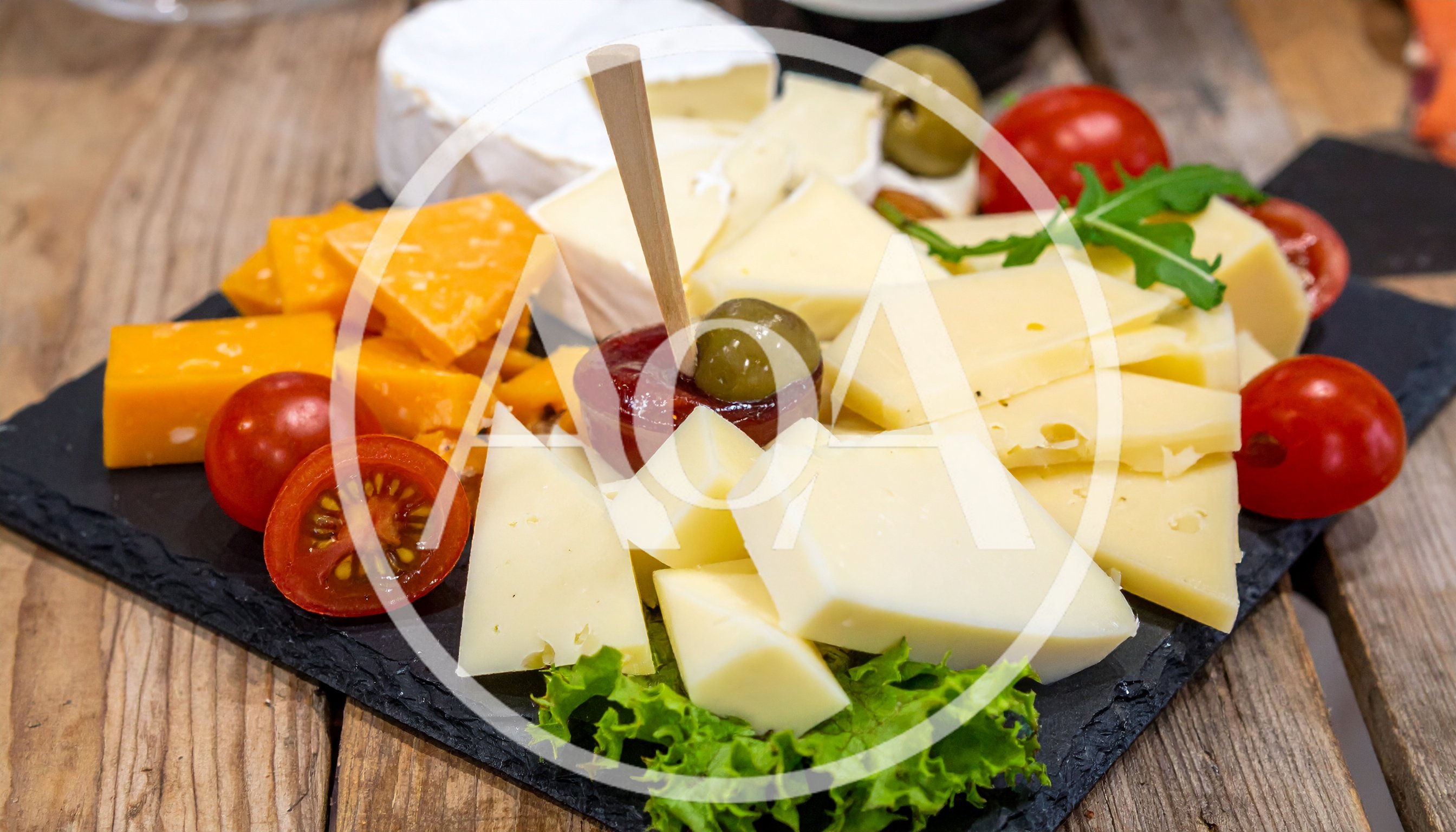 Gourmet Cheese Platter With Fresh Vegetables