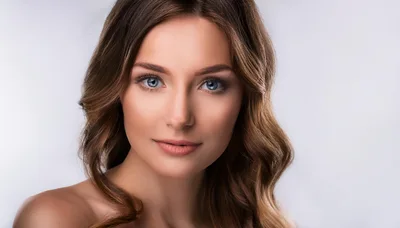 Portrait Of A Beautiful Young Woman With Wavy Hair