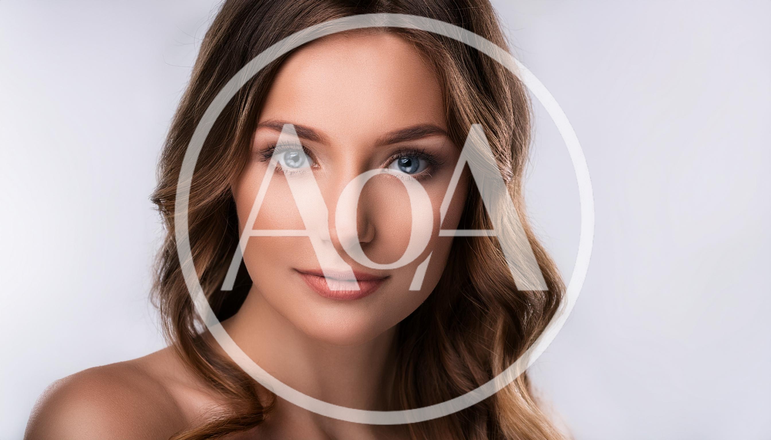 Portrait Of A Beautiful Young Woman With Wavy Hair