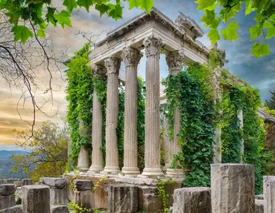 Ancient Roman Temple Ruins Overgrown With Green Ivy