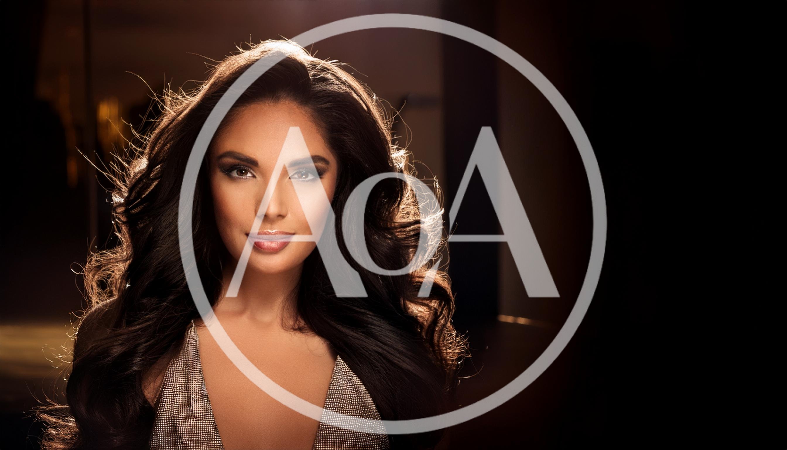 Portrait Of A Glamorous Woman With Long Wavy Hair
