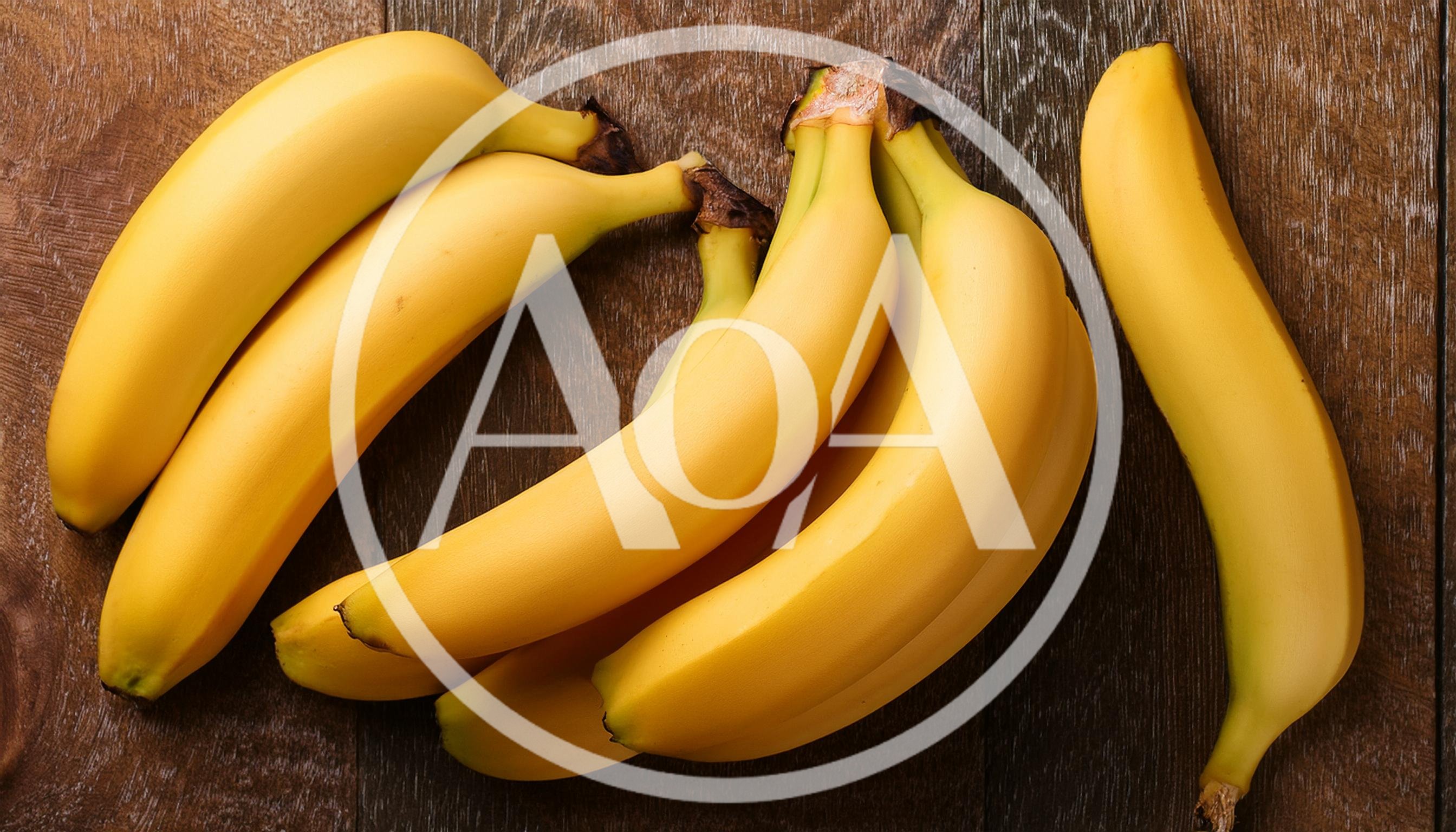Fresh Yellow Bananas Arranged On A Wooden Surface
