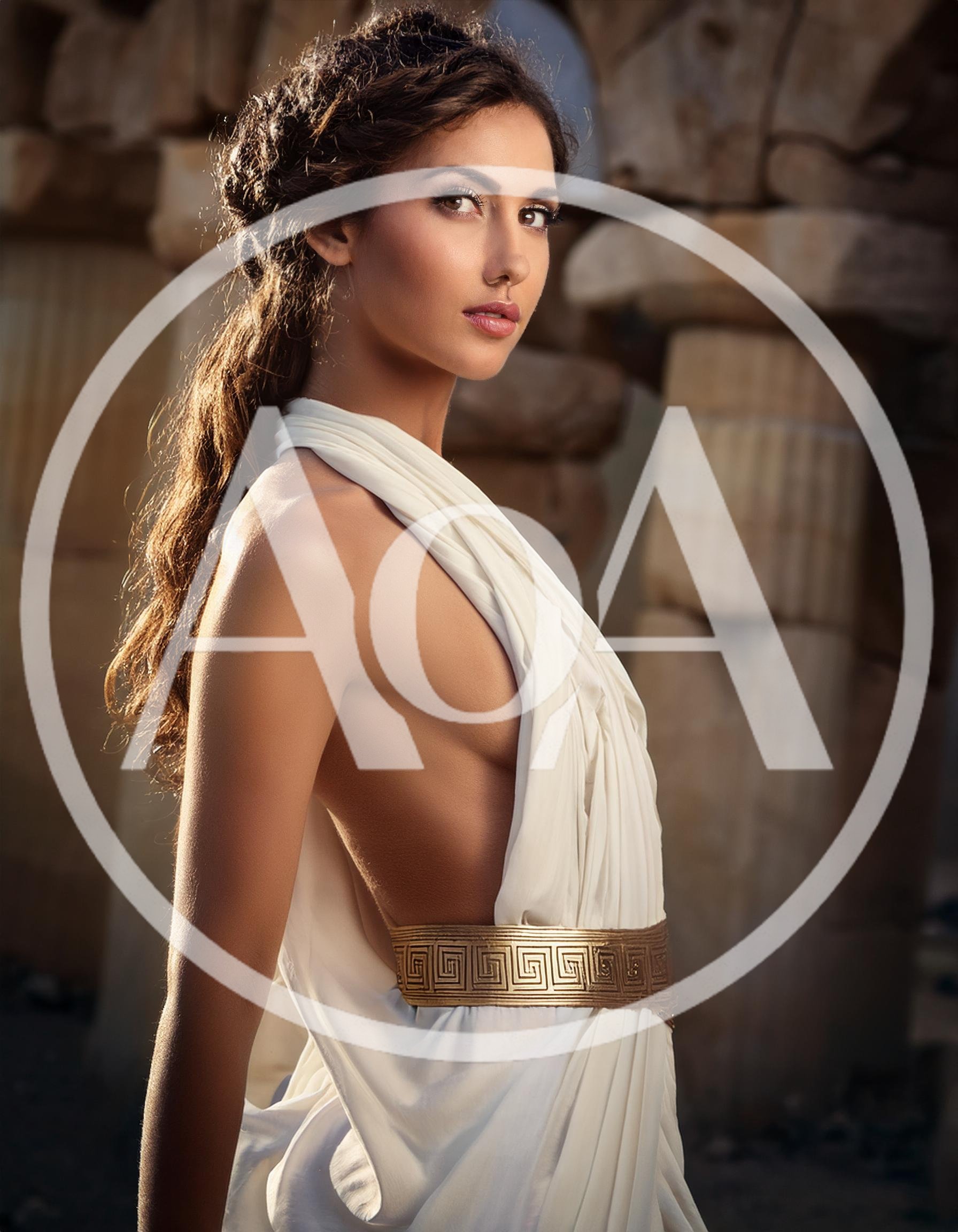 Beautiful Woman Dressed As A Greek Goddess In Ruins